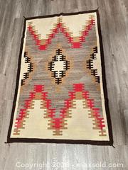 MaxSold Auction: Southwestern Navajo Wool Area Rug 65" x 41" - San Jose (California, USA) SELLER MANAGED Downsizing Online Auction - East Humboldt Street