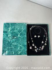 MaxSold Auction: Suzanne Somers Silver-Tone Butterfly & Flower Necklace and Earring Set - San Jose (California, USA) SELLER MANAGED Downsizing Online Auction - East Humboldt Street