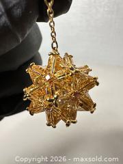 MaxSold Auction: Swarovski Gold-Tone Drop Earrings with Amber Crystals - San Jose (California, USA) SELLER MANAGED Downsizing Online Auction - East Humboldt Street