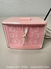 MaxSold Auction: Westclox Pink Plastic Alarm Clock (AC Plug-In) - San Jose (California, USA) SELLER MANAGED Downsizing Online Auction - East Humboldt Street