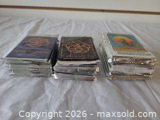 MaxSold Auction: Sealed Booster Packs & Loose Card — Legend of the Five Rings, Dinosaurs, E.T. (26 packs/1 card) - Toronto (Ontario, Canada) PARTNER MANAGED Reseller Online Auction - Queen Street West.