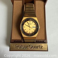 MaxSold Auction: Vintage 2001 Pulsar V103-6089 Gold Tone Day Date Watch | With Casing/Box - Toronto (Ontario, Canada) SELLER MANAGED Reseller Online Auction -  Crouse Road (STORAGE)