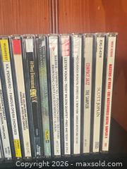 MaxSold Auction: CD Collection and Holders - Houston (Texas, USA) SELLER MANAGED Downsizing Online Auction - Coleridge Street