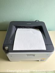 MaxSold Auction: HL-21 Brother Printer and Steelcase 2-drawer Lateral Filing Cabinet - Houston (Texas, USA) SELLER MANAGED Downsizing Online Auction - Coleridge Street