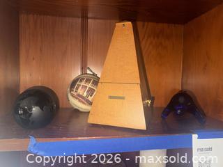 MaxSold Auction: Seth Thomas Metronome, blue paper weight, Christmas ornament - Houston (Texas, USA) SELLER MANAGED Downsizing Online Auction - Coleridge Street