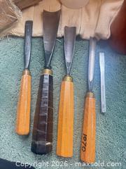 MaxSold Auction: Vintage Wood  Carver Tools and Apron - Houston (Texas, USA) SELLER MANAGED Downsizing Online Auction - Coleridge Street