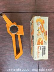 MaxSold Auction: Moulinex Handheld Rotary Grater (Orange) - Cary (North Carolina, USA) PARTNER MANAGED Downsizing Online Auction - Magerton Court