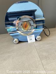 MaxSold Auction: Crosley Retro Art Deco AM/FM Radio, Blue Mirrored Glass - Toronto (Ontario, Canada) SELLER MANAGED Downsizing Online Auction - Winners Circle