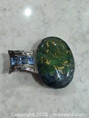 MaxSold Auction: Green Plated Base Metal Pendant with Blue Square Rhinestones - Trent Hills (Ontario, Canada) SELLER MANAGED Reseller Online Auction - Industrial Drive