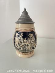 MaxSold Auction: Set of 4 Vintage German Ceramic Stoneware Beer Steins with Pewter Lids - Strathroy-Caradoc (Ontario, Canada) SELLER MANAGED Estate Sale Online Auction - Claire Court