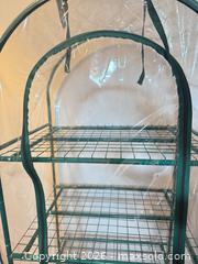 MaxSold Auction: This item is a 4-tier mini greenhouse with a steel frame and a clear PVC cover.  - Strathroy-Caradoc (Ontario, Canada) SELLER MANAGED Estate Sale Online Auction - Claire Court