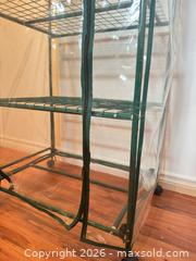 MaxSold Auction: This item is a 4-tier mini greenhouse with a steel frame and a clear PVC cover.  - Strathroy-Caradoc (Ontario, Canada) SELLER MANAGED Estate Sale Online Auction - Claire Court