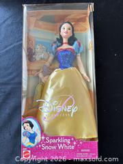 MaxSold Auction: Mattel & Disney Snow White and Seven Dwarfs 11-Piece Doll & Book Lot - Novato (California, USA) SELLER MANAGED Estate Sale Online Auction - Nina Drive