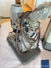 MaxSold Auction: Vintage Bell & Howell Projector with Screen - Novato (California, USA) SELLER MANAGED Estate Sale Online Auction - Nina Drive