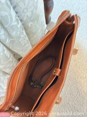 MaxSold Auction: Vintage Dooney & Bourke All-Weather Leather Zip-Top Tote - Novato (California, USA) SELLER MANAGED Estate Sale Online Auction - Nina Drive