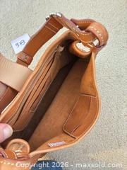 MaxSold Auction: Vintage Dooney & Bourke Donegal British Tan Leather Small Feed Bag - Novato (California, USA) SELLER MANAGED Estate Sale Online Auction - Nina Drive
