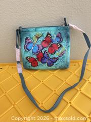 MaxSold Auction: Anuschka Turquoise Multicolor Painted Leather Crossbody/Shoulder Bag - Las Vegas (Nevada, USA) PARTNER MANAGED Estate Sale Online Auction -  Argent Star Court
