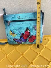 MaxSold Auction: Anuschka Turquoise Multicolor Painted Leather Crossbody/Shoulder Bag - Las Vegas (Nevada, USA) PARTNER MANAGED Estate Sale Online Auction -  Argent Star Court