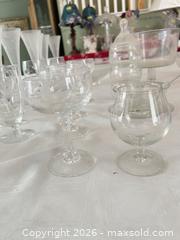 MaxSold Auction: Clear & Frosted Etched Floral Glassware Set — 30+ Pieces - Las Vegas (Nevada, USA) PARTNER MANAGED Estate Sale Online Auction -  Argent Star Court
