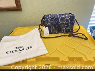 MaxSold Auction: Coach Blue Leather Medium Crossbody Bag with Floral Appliqué - Las Vegas (Nevada, USA) PARTNER MANAGED Estate Sale Online Auction -  Argent Star Court