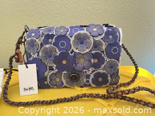 MaxSold Auction: Coach Blue Leather Medium Crossbody Bag with Floral Appliqué - Las Vegas (Nevada, USA) PARTNER MANAGED Estate Sale Online Auction -  Argent Star Court