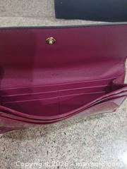 MaxSold Auction: Coach Fuchsia PVC Coated Canvas Clutch with Gold-Tone Hardware - Las Vegas (Nevada, USA) PARTNER MANAGED Estate Sale Online Auction -  Argent Star Court