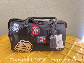 MaxSold Auction: Coach Leather Badlands Varsity Patch Satchel - Las Vegas (Nevada, USA) PARTNER MANAGED Estate Sale Online Auction -  Argent Star Court