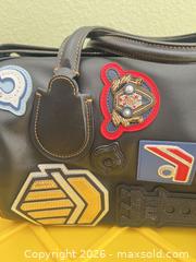 MaxSold Auction: Coach Leather Badlands Varsity Patch Satchel - Las Vegas (Nevada, USA) PARTNER MANAGED Estate Sale Online Auction -  Argent Star Court