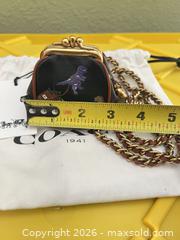 MaxSold Auction: Coach Leather Dinosaur Print Mini Crossbody Bag - Las Vegas (Nevada, USA) PARTNER MANAGED Estate Sale Online Auction -  Argent Star Court