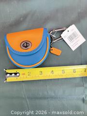 MaxSold Auction: Coach Leather Keychain / Key Fob Blue & Orange - Las Vegas (Nevada, USA) PARTNER MANAGED Estate Sale Online Auction -  Argent Star Court