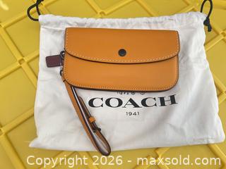 MaxSold Auction: Coach Leather Wristlet with Snap Button & Zipper - Las Vegas (Nevada, USA) PARTNER MANAGED Estate Sale Online Auction -  Argent Star Court