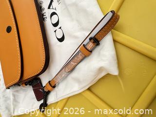 MaxSold Auction: Coach Leather Wristlet with Snap Button & Zipper - Las Vegas (Nevada, USA) PARTNER MANAGED Estate Sale Online Auction -  Argent Star Court