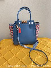 MaxSold Auction: Coach Medium Leather Handbag with Woven Trim & Turn-Lock - Las Vegas (Nevada, USA) PARTNER MANAGED Estate Sale Online Auction -  Argent Star Court