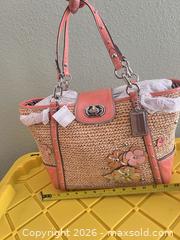 MaxSold Auction: Coach Pink/Coral Medium Straw, Leather & Canvas Tote - Las Vegas (Nevada, USA) PARTNER MANAGED Estate Sale Online Auction -  Argent Star Court