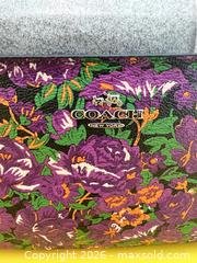 MaxSold Auction: Coach Purple Floral Wristlet Clutch with Silver Hardware - Las Vegas (Nevada, USA) PARTNER MANAGED Estate Sale Online Auction -  Argent Star Court