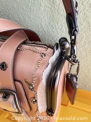 MaxSold Auction: Coach Small Metallic Leather Handbag with Studs - Las Vegas (Nevada, USA) PARTNER MANAGED Estate Sale Online Auction -  Argent Star Court