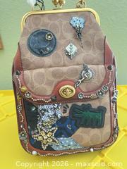 MaxSold Auction: Coach x Keith Herring Signature Patchwork Kisslock Clutch  - Las Vegas (Nevada, USA) PARTNER MANAGED Estate Sale Online Auction -  Argent Star Court