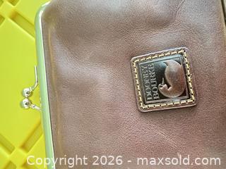 MaxSold Auction: Dooney & Bourke Brown Genuine Leather Kiss-Lock Coin Purse - Las Vegas (Nevada, USA) PARTNER MANAGED Estate Sale Online Auction -  Argent Star Court