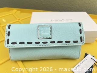 MaxSold Auction: Dooney & Bourke Light Blue Leather Wallet with Brown Trim - Las Vegas (Nevada, USA) PARTNER MANAGED Estate Sale Online Auction -  Argent Star Court