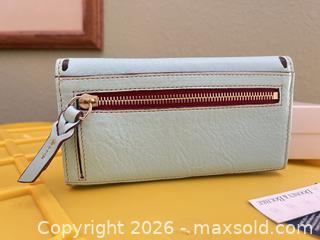 MaxSold Auction: Dooney & Bourke Light Blue Leather Wallet with Brown Trim - Las Vegas (Nevada, USA) PARTNER MANAGED Estate Sale Online Auction -  Argent Star Court