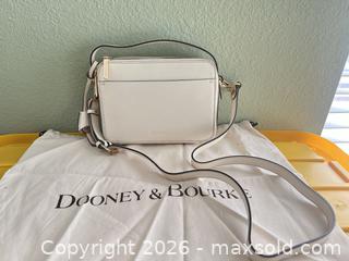 MaxSold Auction: Dooney & Bourke Small Ivory Leather Crossbody Bag - Las Vegas (Nevada, USA) PARTNER MANAGED Estate Sale Online Auction -  Argent Star Court