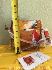 MaxSold Auction: Dooney & Bourke Small Paint-Splatter Leather Crossbody Bag - Las Vegas (Nevada, USA) PARTNER MANAGED Estate Sale Online Auction -  Argent Star Court