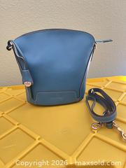 MaxSold Auction: Dooney & Bourke Teal Leather Crossbody Bag - Las Vegas (Nevada, USA) PARTNER MANAGED Estate Sale Online Auction -  Argent Star Court