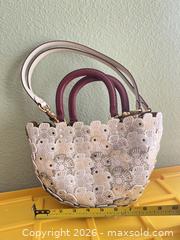 MaxSold Auction: Mini Genuine Leather Handbag with Floral Appliqué & Studs - Las Vegas (Nevada, USA) PARTNER MANAGED Estate Sale Online Auction -  Argent Star Court