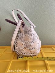 MaxSold Auction: Mini Genuine Leather Handbag with Floral Appliqué & Studs - Las Vegas (Nevada, USA) PARTNER MANAGED Estate Sale Online Auction -  Argent Star Court