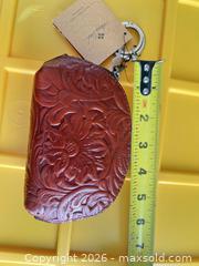 MaxSold Auction: Patricia Nash Genuine Leather Tooled Floral Coin Purse - Las Vegas (Nevada, USA) PARTNER MANAGED Estate Sale Online Auction -  Argent Star Court
