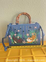 MaxSold Auction: Radley Blue Leather Top-Handle Satchel with Novelty Applique - Las Vegas (Nevada, USA) PARTNER MANAGED Estate Sale Online Auction -  Argent Star Court