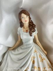 MaxSold Auction: Royal Doulton Bone China HN5907 'November - Topaz' Figurine 17 cm - Las Vegas (Nevada, USA) PARTNER MANAGED Estate Sale Online Auction -  Argent Star Court