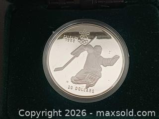 MaxSold Auction: 1988 Calgary Olympic Winter Game Canadian $20 (925) Silver Coin - Toronto (Ontario, Canada) PARTNER MANAGED Reseller Online Auction - Queen Street West.