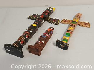 MaxSold Auction: Lot of 3 Souvenir Indigenous Northwest Cost Totem Poles - Toronto (Ontario, Canada) PARTNER MANAGED Reseller Online Auction - Queen Street West.
